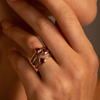 14k Gold Diamond and Rhodolite Heart Rings in a delicate little stack with the gold garnet heart rings on model