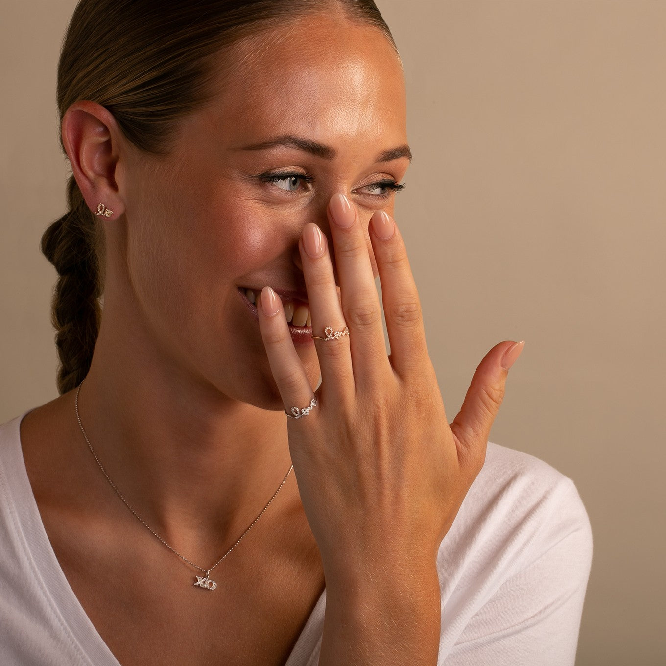 Sydney Evan  14K Yellow Gold Love Diamond Studs on model, styled with Diamond Love Rings