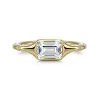 Cael Bezel East West Emerald Cut Solitaire