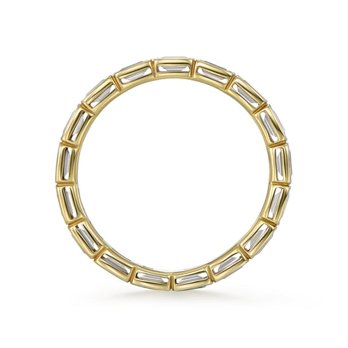 Side view of the Vela full eternity band in 18k yellow gold, featuring horizontally set emerald-cut diamonds in a sleek bezel setting