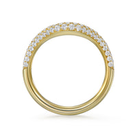 side view Wave Diamond Pavé Band in 18k yellow gold shown on hand, three rows of handmade pavé diamonds