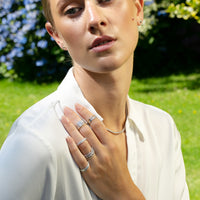 18k Gold Marquise and Round Diamond Band styled with stacking bands on model- Thomas Laine Jewelry