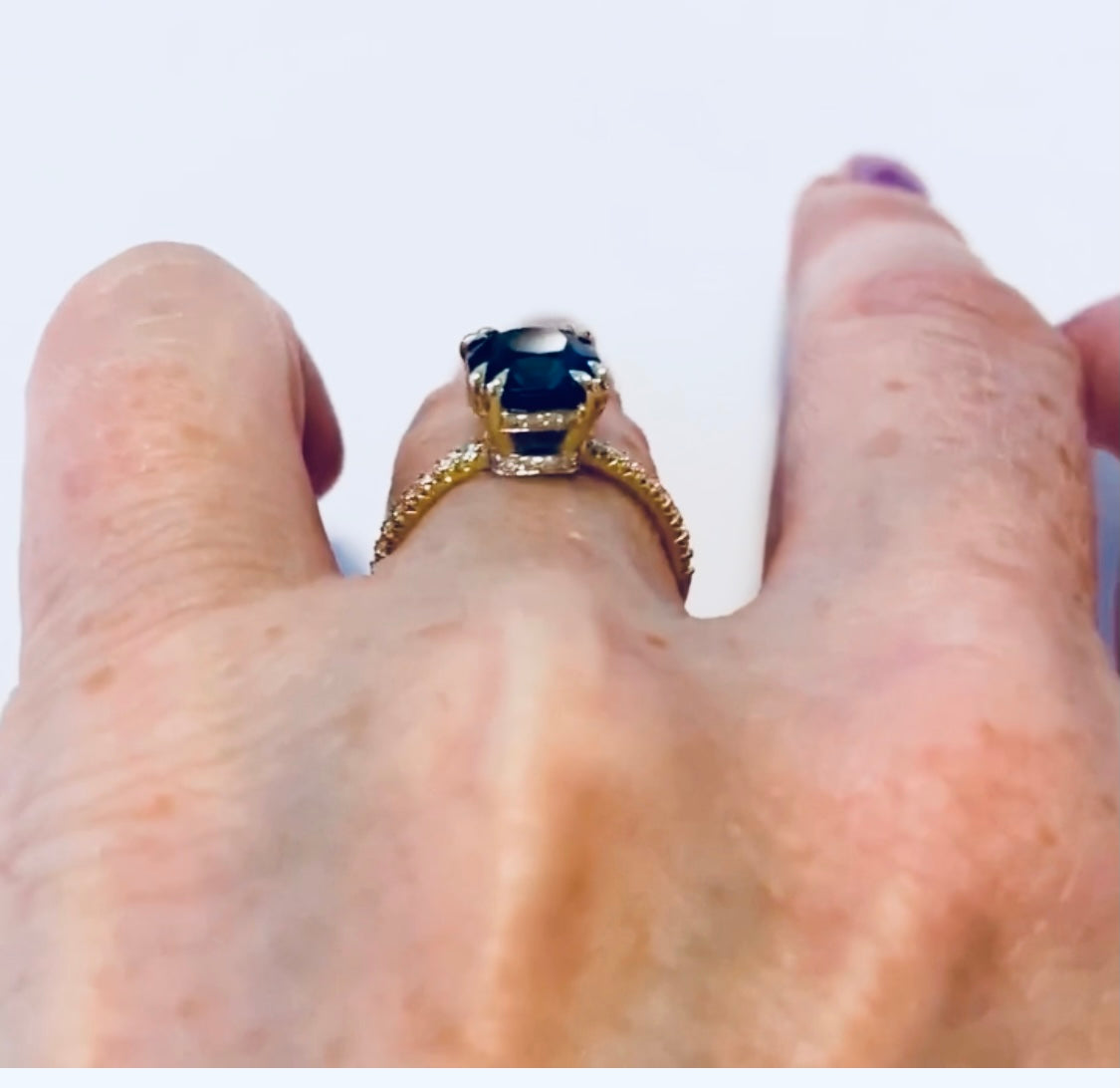 Low profile view on model 18K Yellow Gold Cushion Cut Peacock Blue Spinel Engagement Ring