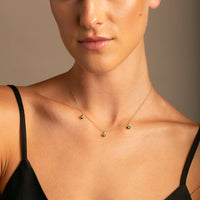 14K Yellow Gold Bezel Set Emerald Drop Neckace c;lose up profile- Thomas Laine Jewelry