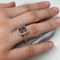 18K Rose Gold Ring 3.03 tcw. Lavender Spinel surrounding by a halo of scintillating VS quality diamonds.