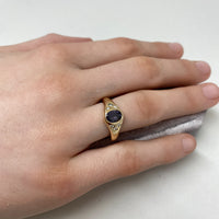 14k Yellow Gold Purple Spinel and Diamond Signet Pinky Ring on model hand