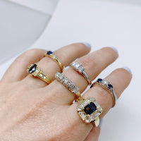 Vintage 14K Yellow Gold Diamond and Emerald Cut sapphire Dress ring on model