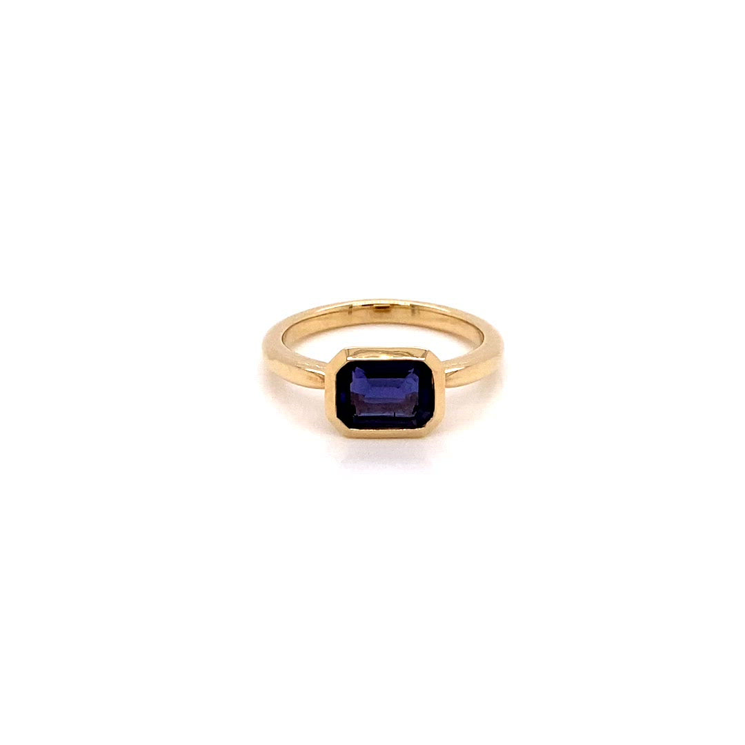 Video - 10K Yellow Gold Emerald Cut Iolite  East to West  Bezel Set Stacking Ring