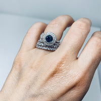 Ring Stack on Model - Double Diamond Halo Teal Montana Sapphire Engagement Ring and Matching diamond wedding bands