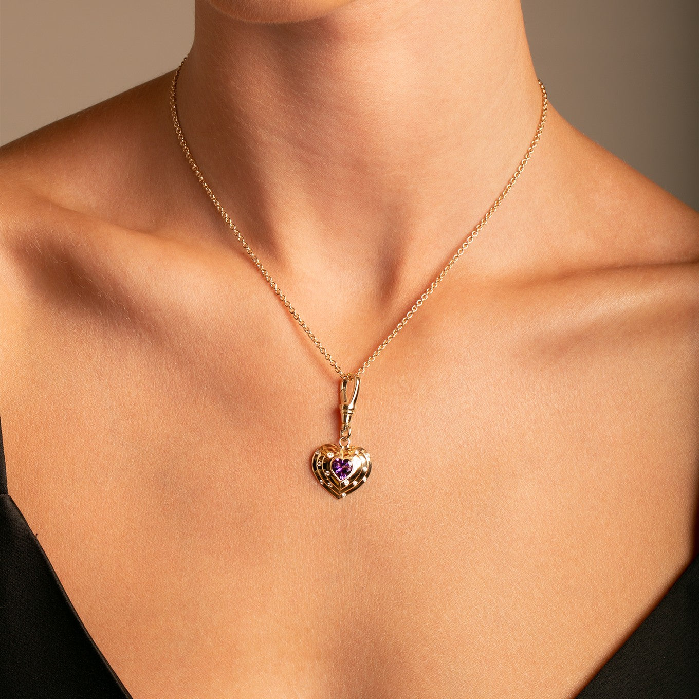 14k Yellow Gold, Natural Vibrant Amethyst and Diamond Heart Charm with Vintage-Inspired Dog Clip on model