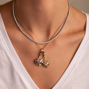 Amethyst and 14k Yellow Gold Orange Spessartite Garnet Diamond Heart Charm with Vintage-Inspired Dog Clips casually styled  with Diamond Tennis Necklace  and white T-shirt
