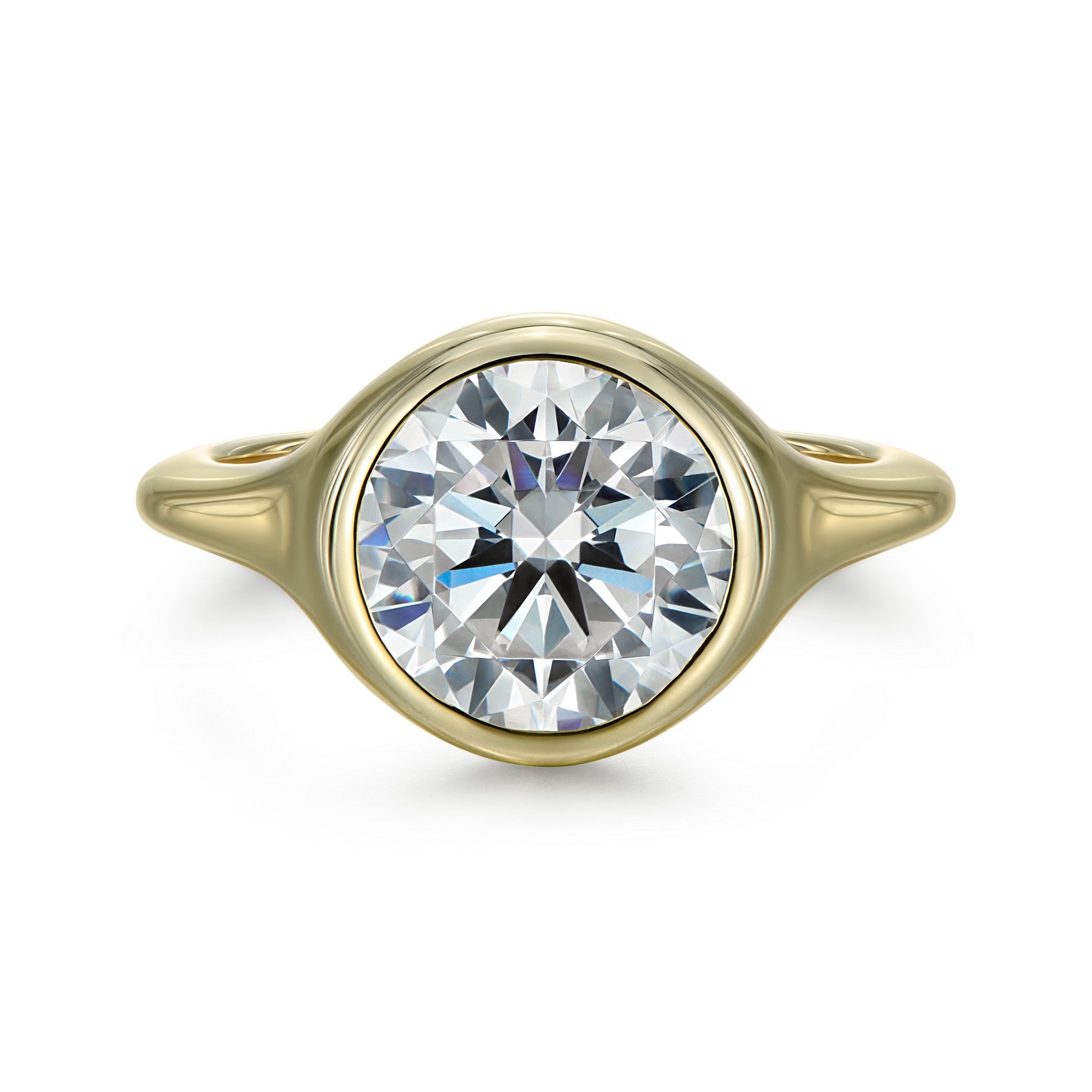 Solene round solitaire engagement ring with bezel set round brilliant diamond in high polish yellow gold
