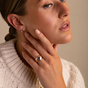 14k Yellow Gold Pink Tourmaline Heart Stud Earrings on model styled casually with Amethyst and Diamond Heart Ring