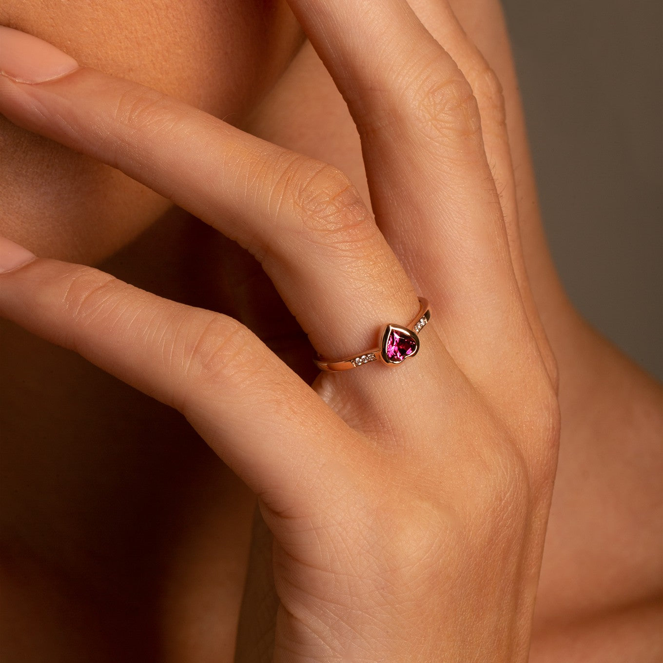 14k Yellow Gold Diamond and Garnet Heart ring on model