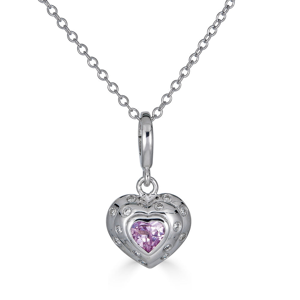 Luxurious 14k White Gold, this petite charm showcases a vibrant pink sapphire, echoing the intense hues of passion and romance, while delicate diamonds frame its edges, adding a touch of timeless sophistication.