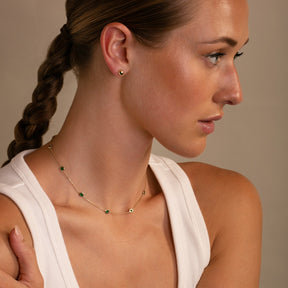 Ten Stone Bezel Set Emerald Necklace  with Bezel Set Emerald Studs- Thomas Laine Jewelry on model