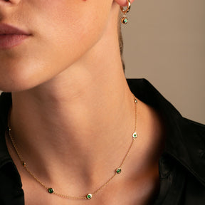 Ten Stone Bezel Set Emerald Necklace and Emerald Gypset Hoops on Model- Thomas Laine Jewelry