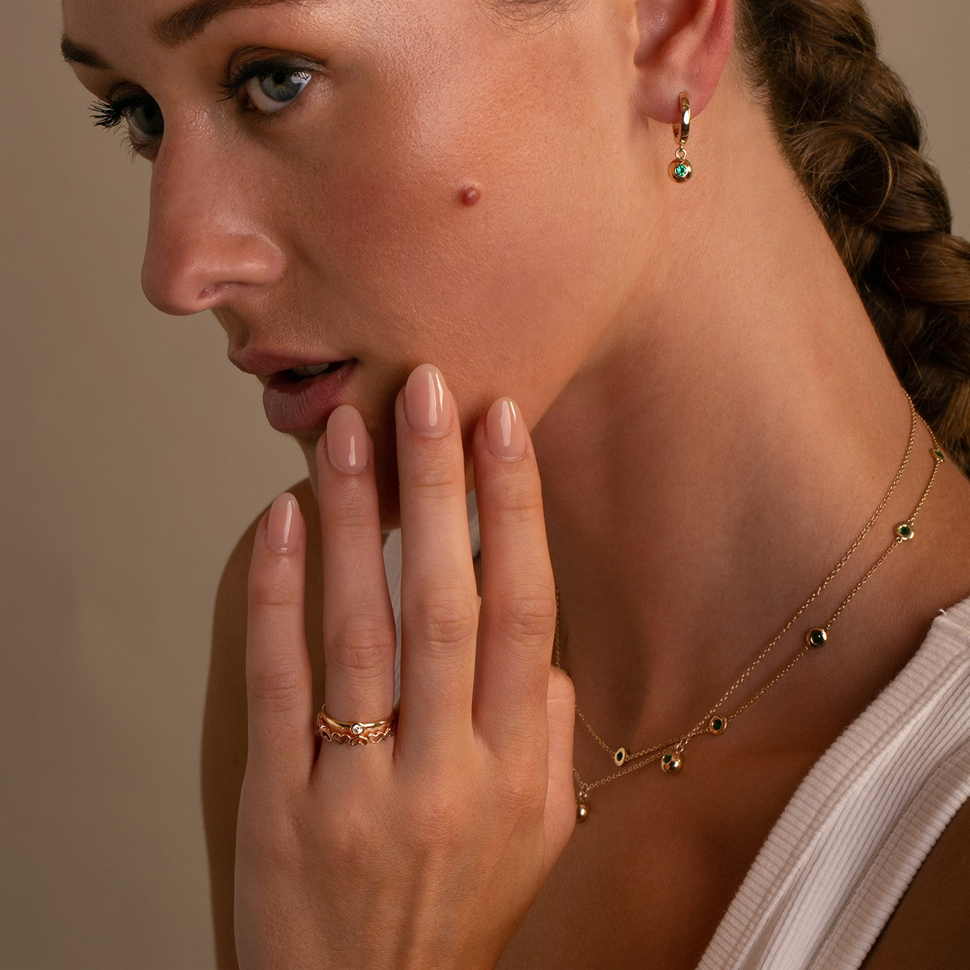 14K Yellow Gold Bezel Set Emerald Drop Hoops -Summer styling on model Thomas Laine Jewelry