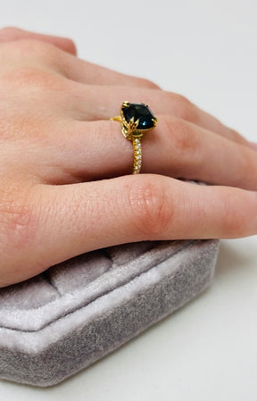 18K Yellow Gold Cushion Cut Peacock Blue Spinel Engagement Ring on Model 