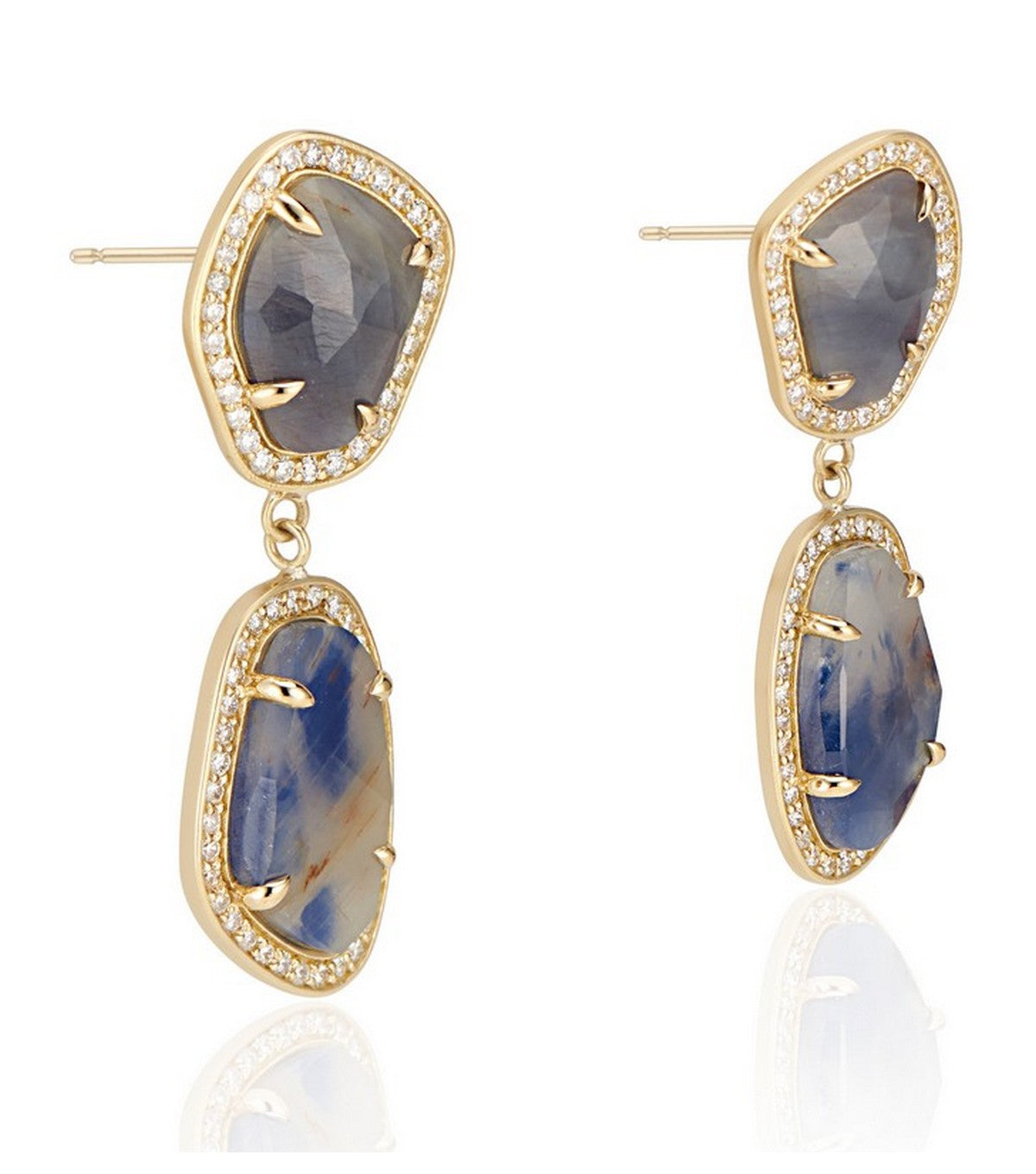18K yellow gold, these one-of-a-kind earrings are designed to emphasize the wild and raw beauty of the natural sapphires.