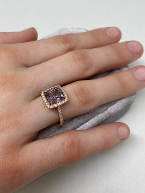 18K Rose Gold Ring 3.03 tcw. Lavender Spinel surrounding by a halo of scintillating VS quality diamonds.