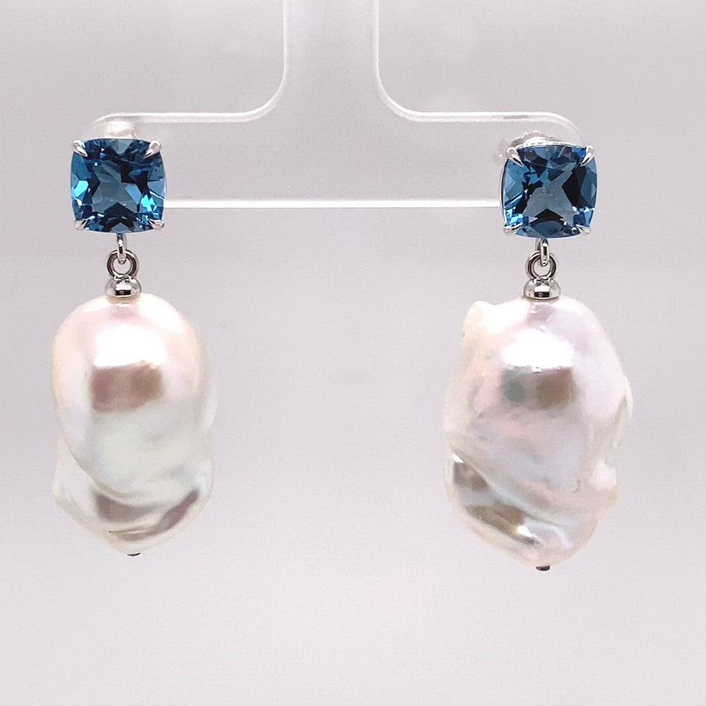 Video  Striking Cushion Cut London Blue Topaz with a luminous natural white baroque pearl drop earrings