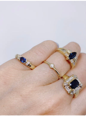Vintage 14K Yellow Gold Diamond East West Oval Sapphire Ring on model